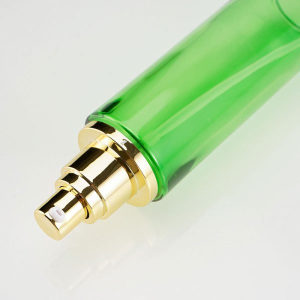 green glass lotion pump bottle