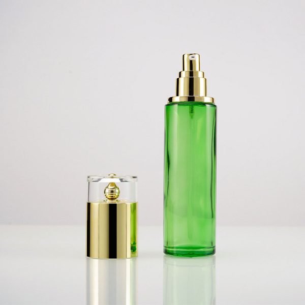 Green glass lotion pump bottle