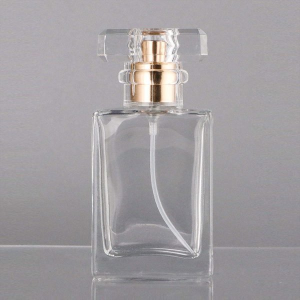 clear glass empty perfume bottle