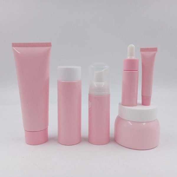 pink cosmetic tube bottle and jars