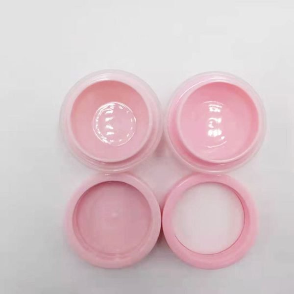 small plastic jars with lids