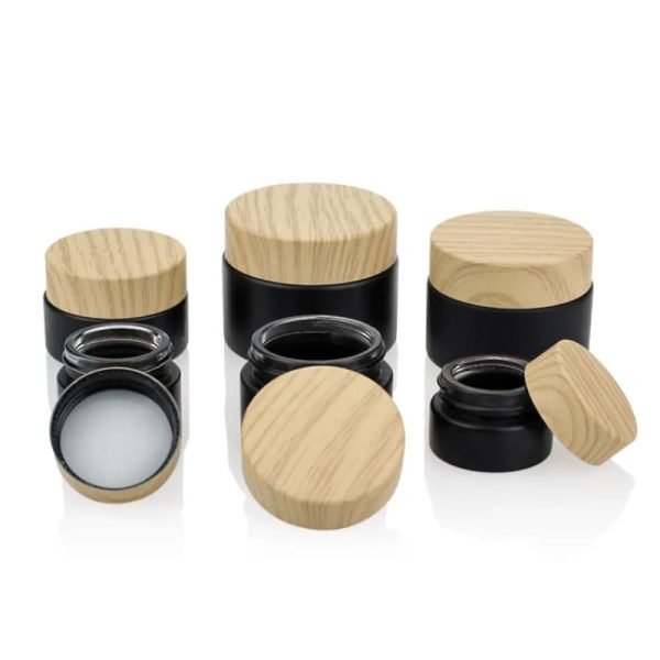 black cosmetic jars with bamboo lids