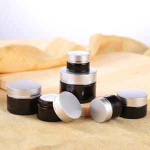 luxury black cream jar with silver lid