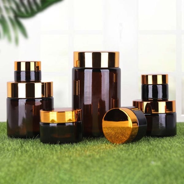 custom amber glass cream jar with gold lids