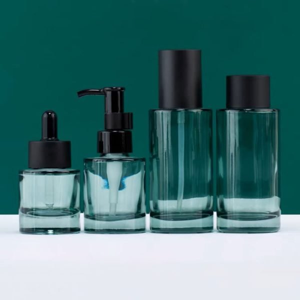 dark green glass pump bottles