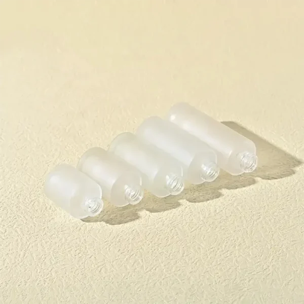 frosted glass essential oil bottle
