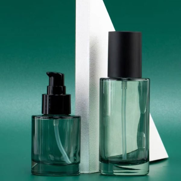 green glass lotion pump bottle