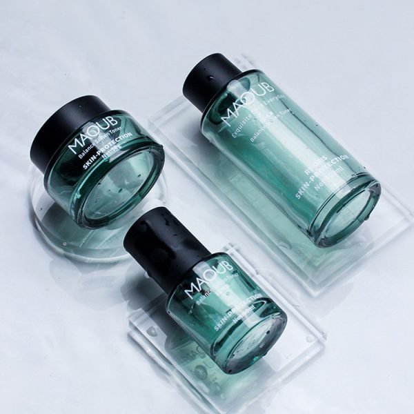 green glass skincare packaging set