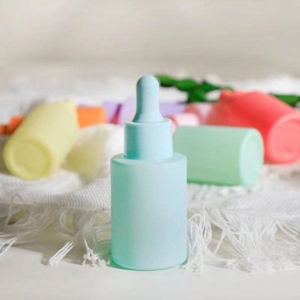 light green matte colored glass dropper bottle