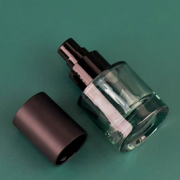 small glass pump bottle