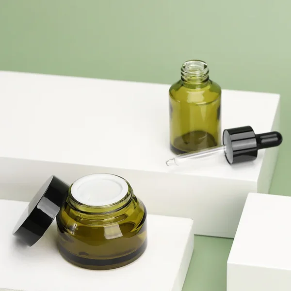 green essential oil dropper bottle