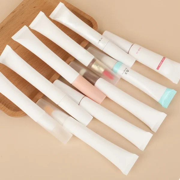 squeeze tube with brush head