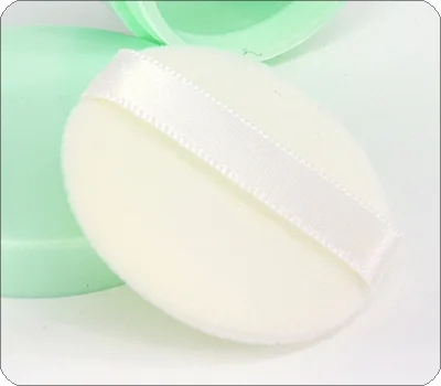 empty face powder container with puff