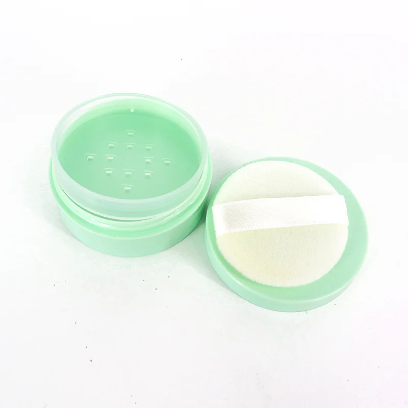 green empty powder puff container