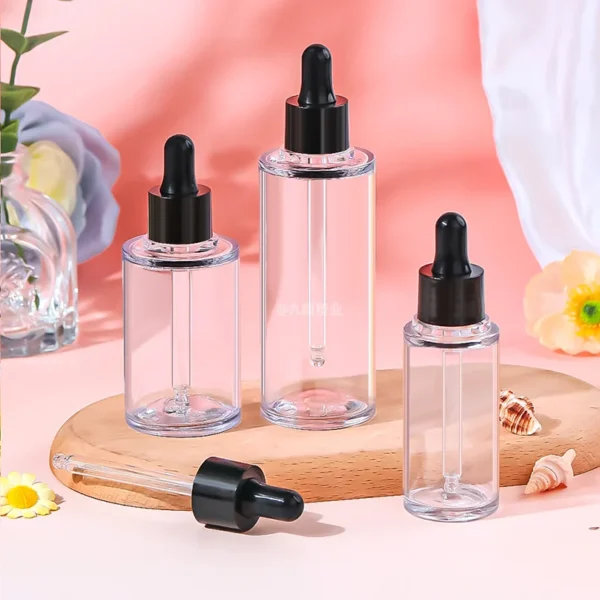 clear PETG plastic bottle with black rubber bulb