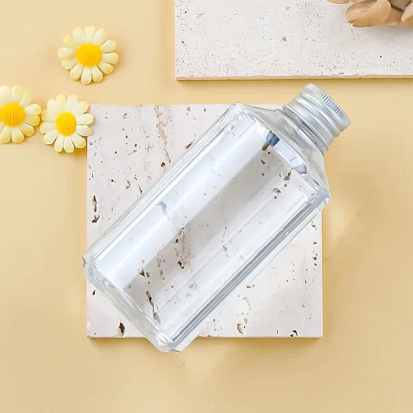 clear plastic bottle with aluminum cap