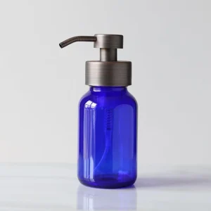 blue glass hand sanitizer dispenser