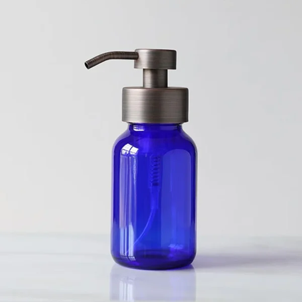 blue glass hand sanitizer dispenser