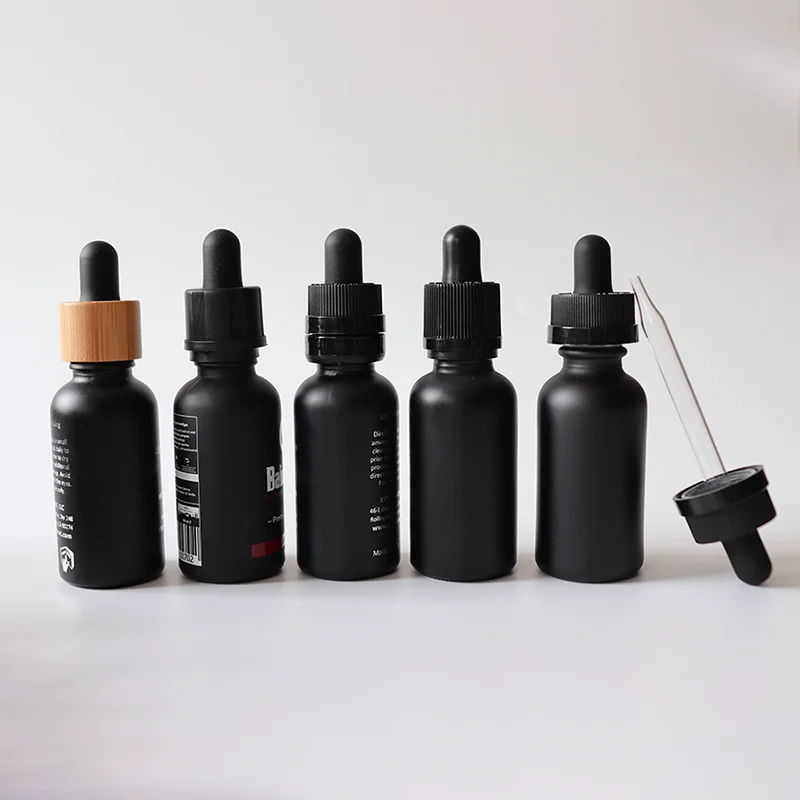 black essential oil dropper bottles