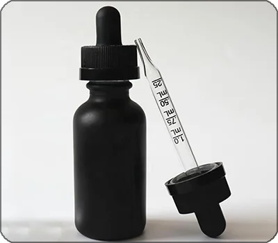 essential oil bottle with pipette dropper