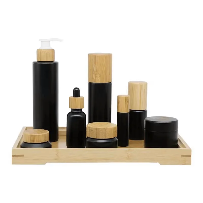 matte black glass pump bottles with bamboo lids