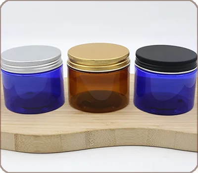 plastic jars with black silver gold lids