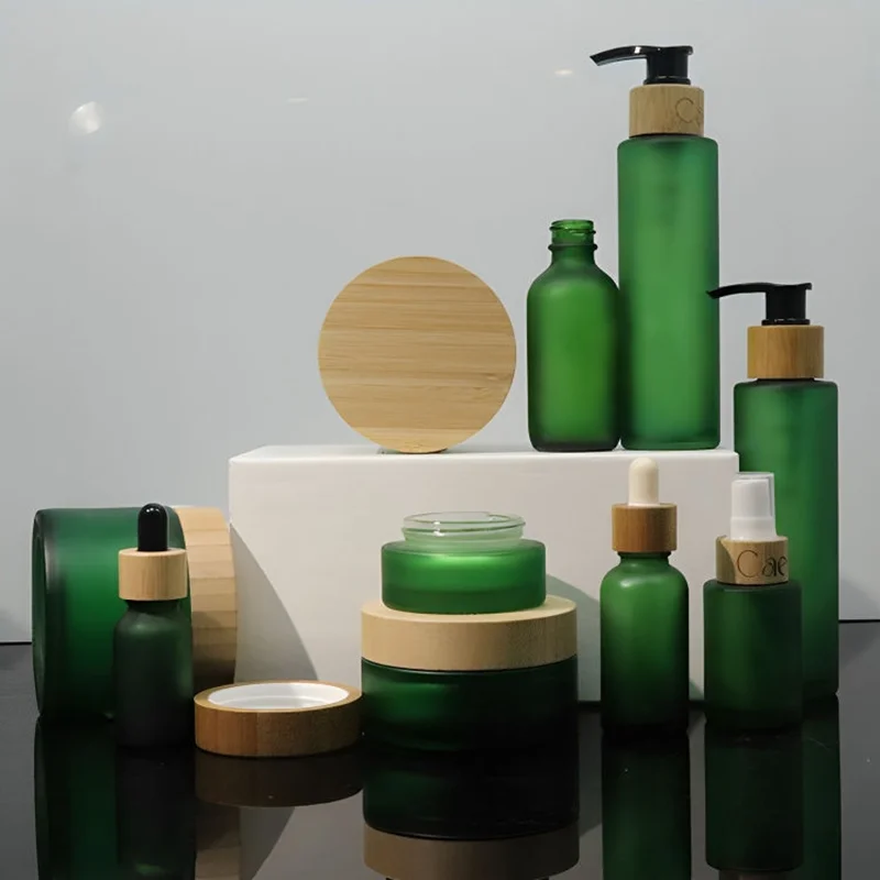 dark green frosted glass pump bottle dropper bottle cream jar