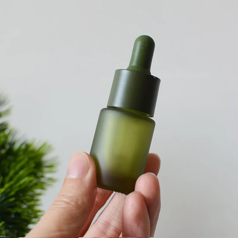 frosted glass green dropper bottle