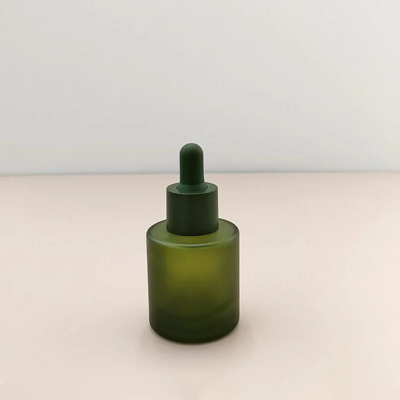 frosted glass serum dropper green bottle