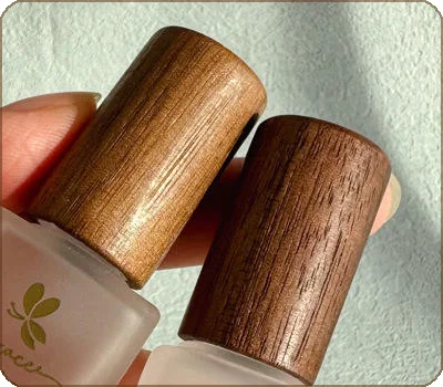 glass roll on bottle with walnut wood cap