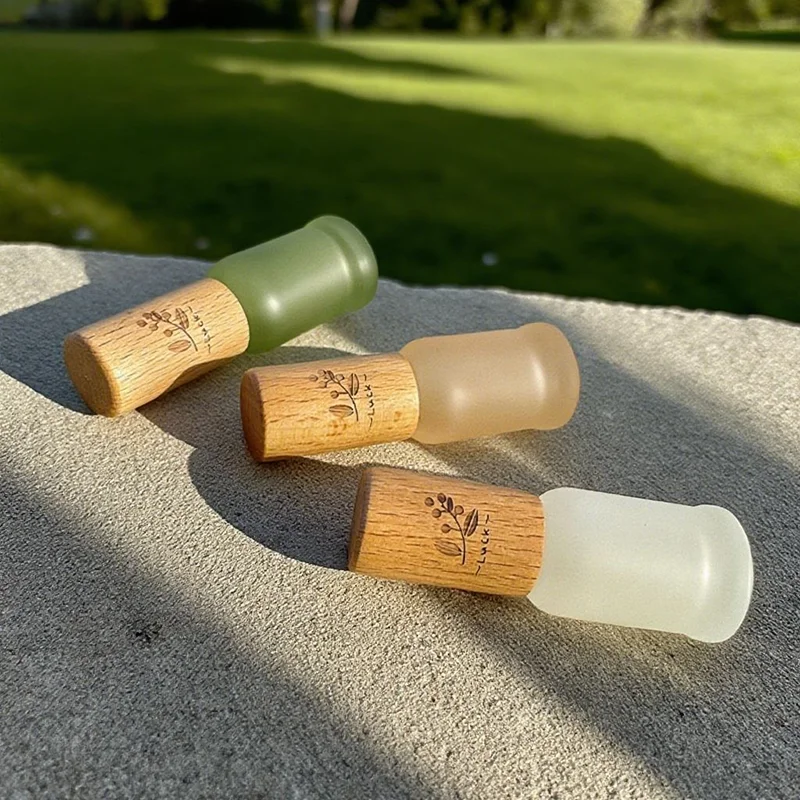 glass rollerball perfume bottle with wood lid