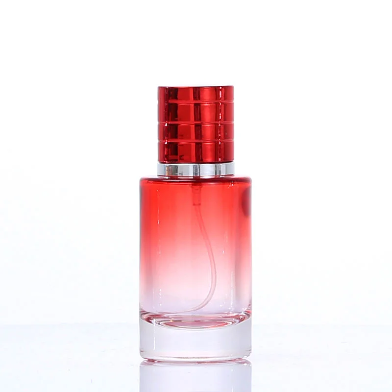 gradient red glass cologne bottle