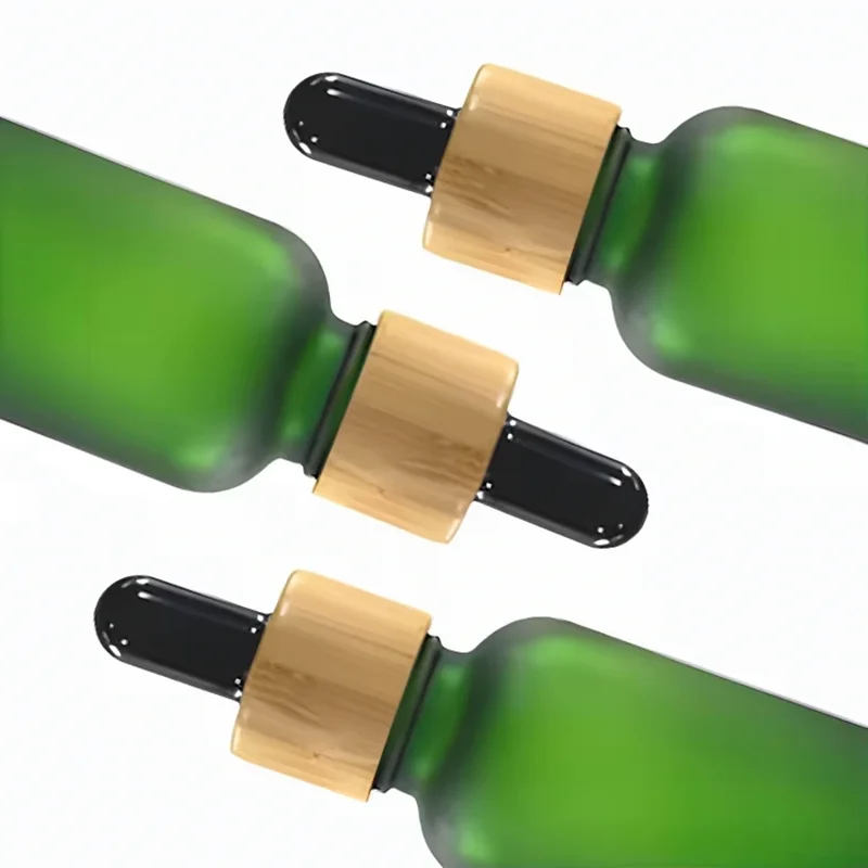 green glass dropper bottles with bamboo lids