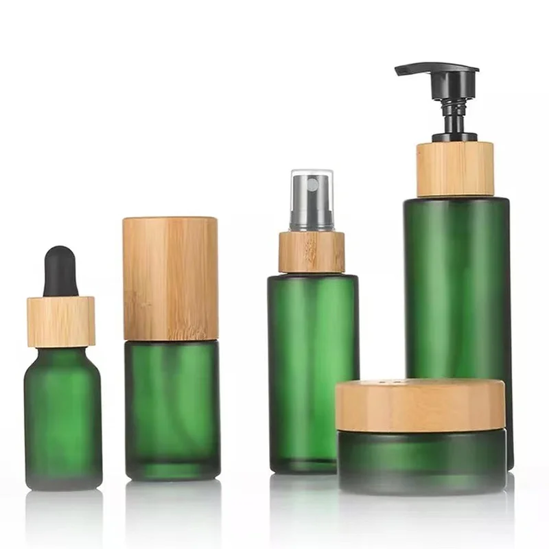 green glass lotion pump containers with bamboo cap