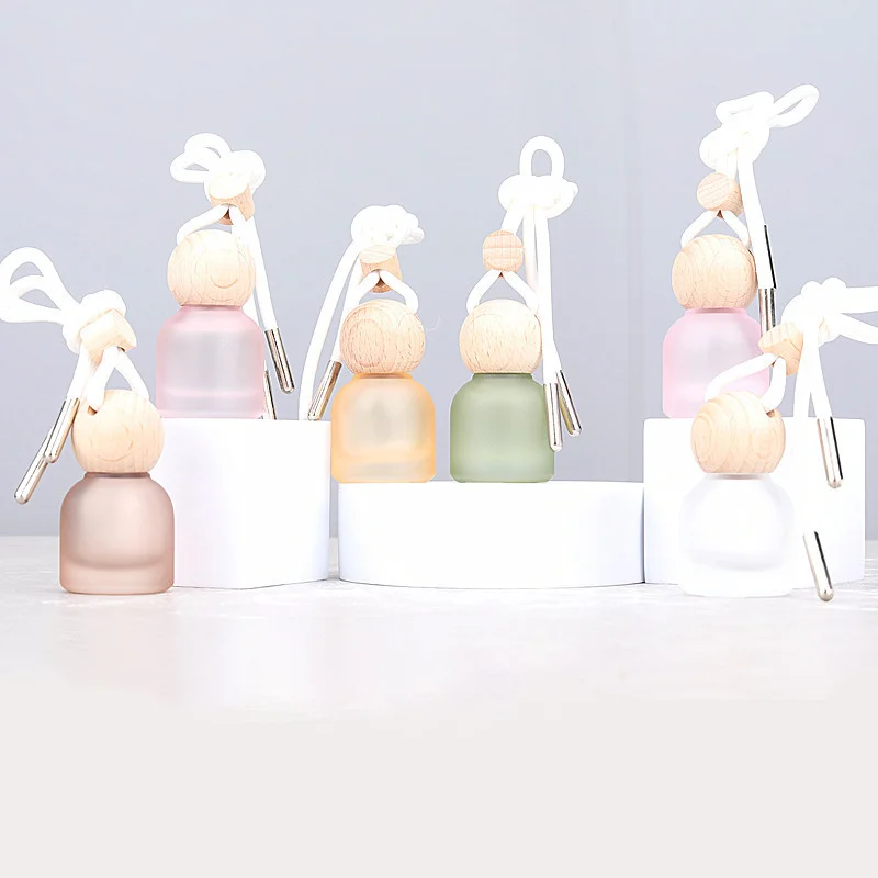 hanging car air freshener bottle