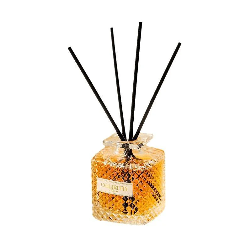 luxury glass diffuser sticks and bottle