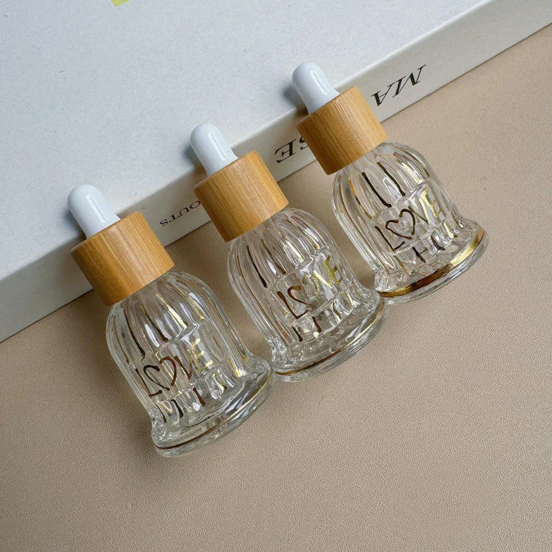 small tincture bottles with dropper