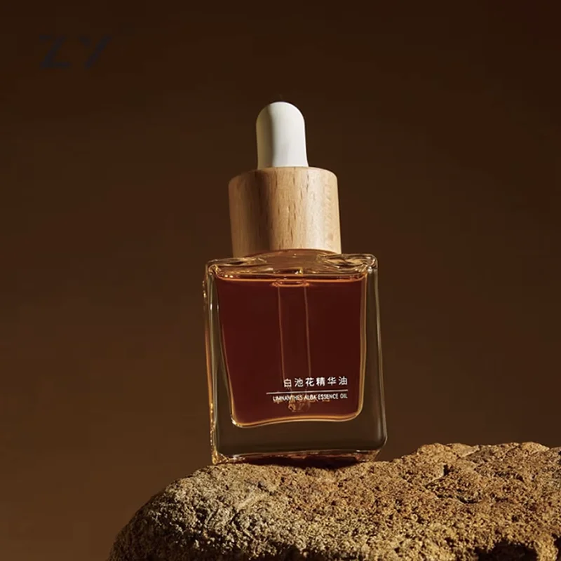 amber glass essential oil bottle with dropper