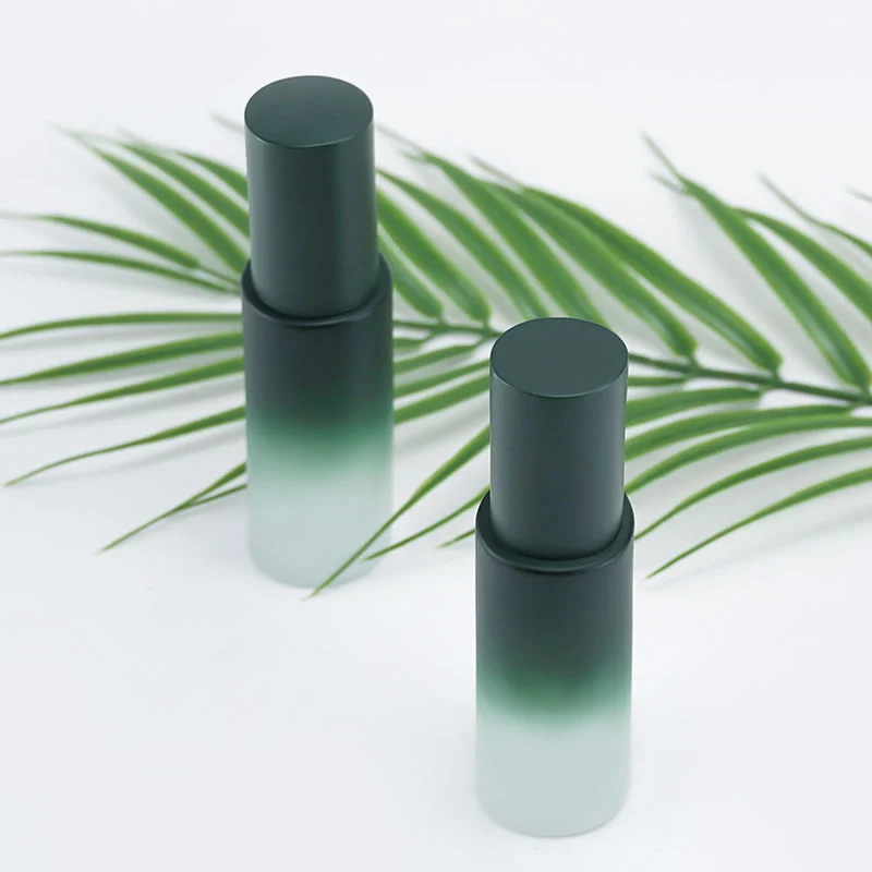 empty green cologne bottle