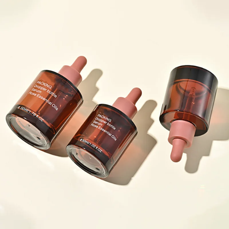 empty red tincture glass dropper bottles