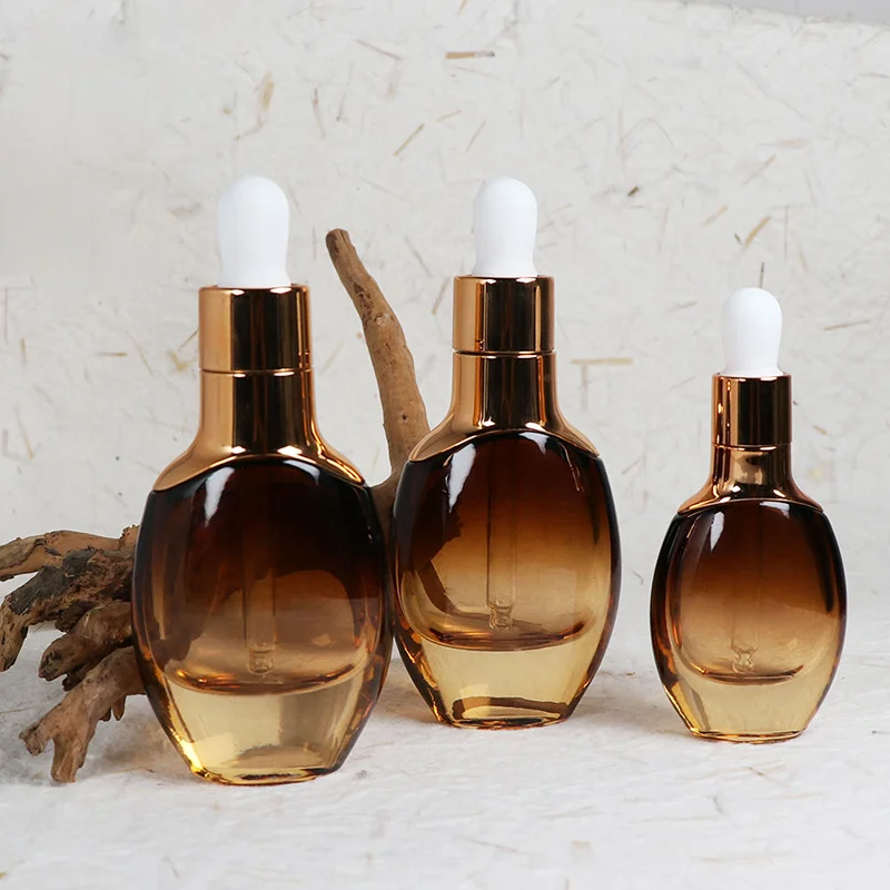 gradient amber glass essential oil bottles