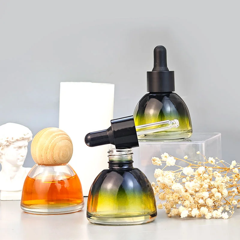 gradient green glass essential oil bottle