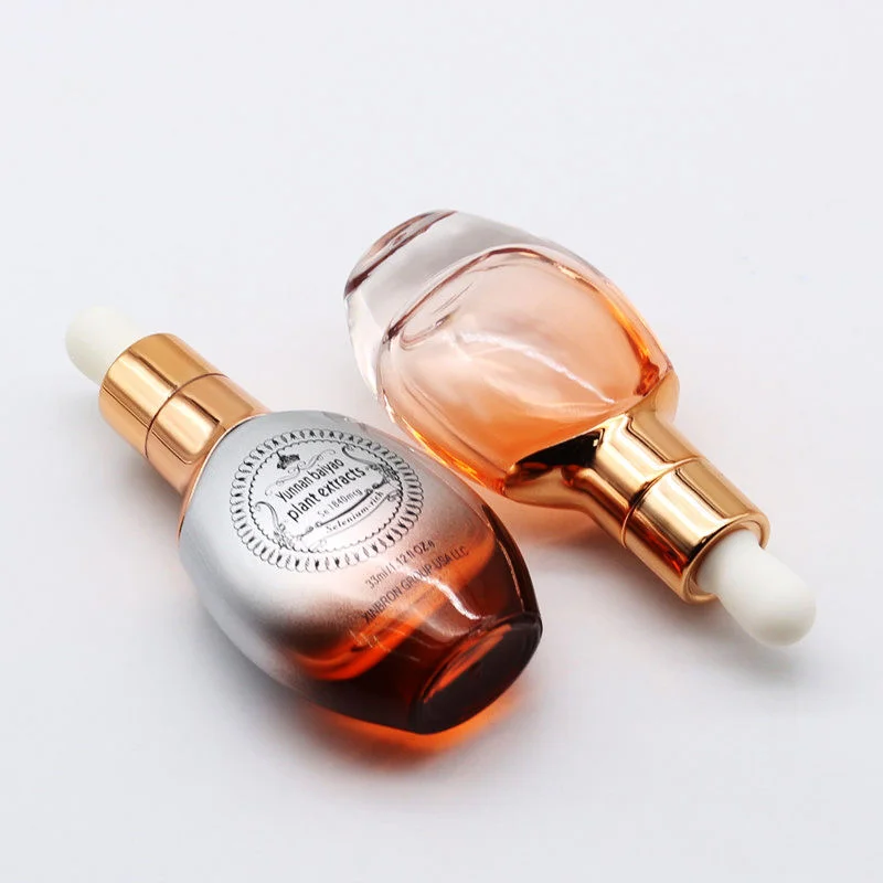 gradient pink oval serum bottles