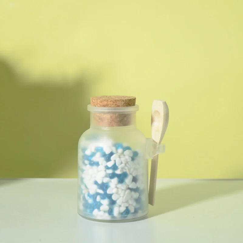bath salt jar with wooden spoon